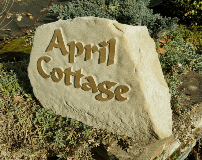 House sign rock boulder